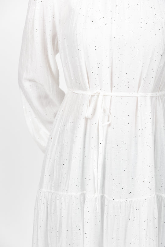 White dress with subtle pattern on a white background